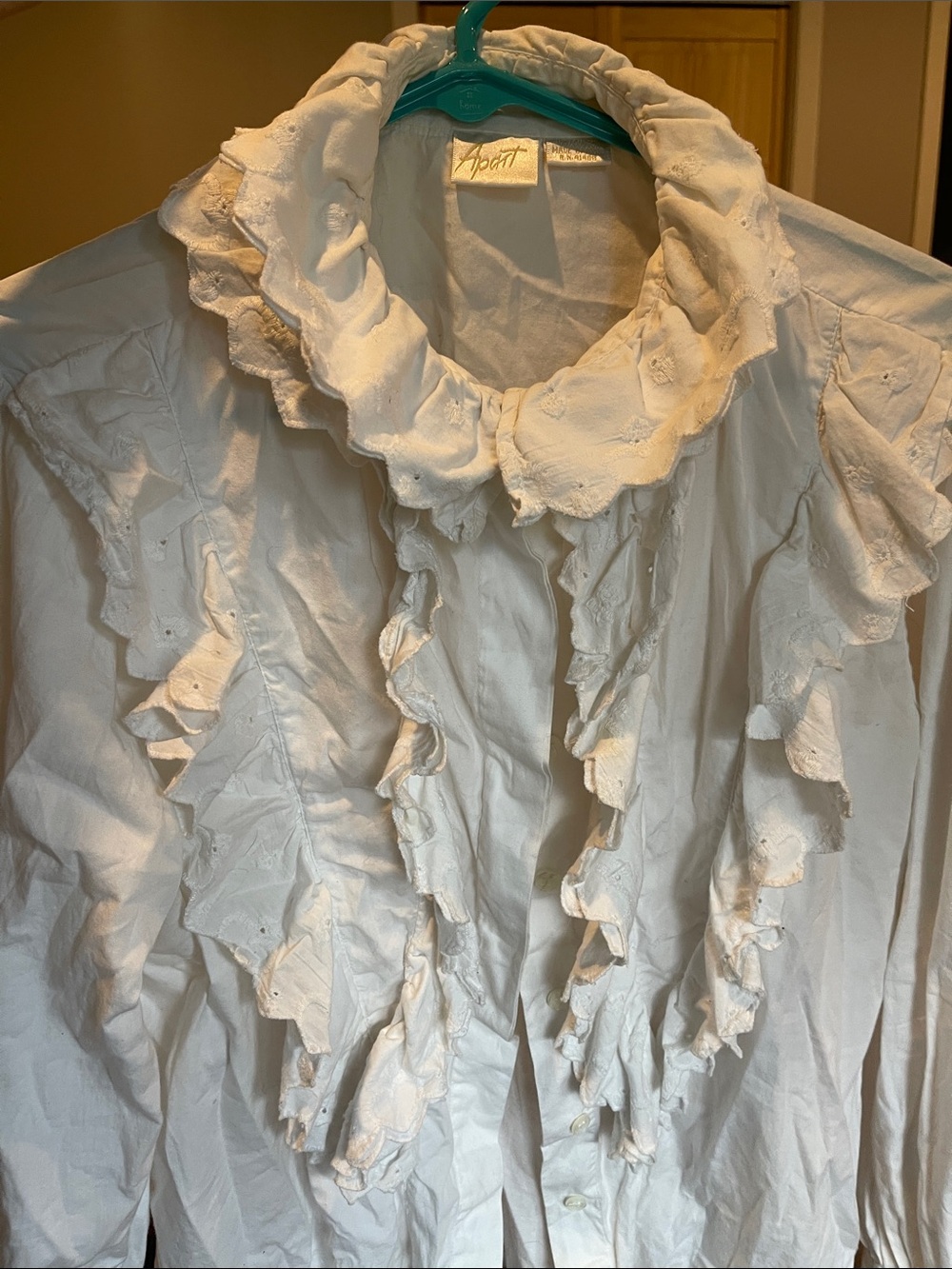 Ruffled white beautifully done button down shirt